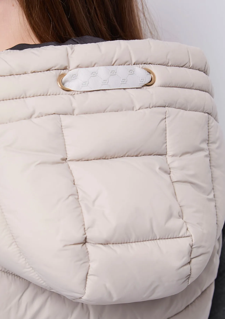 Gilet matelassé en nylon avec capuche pour femme
