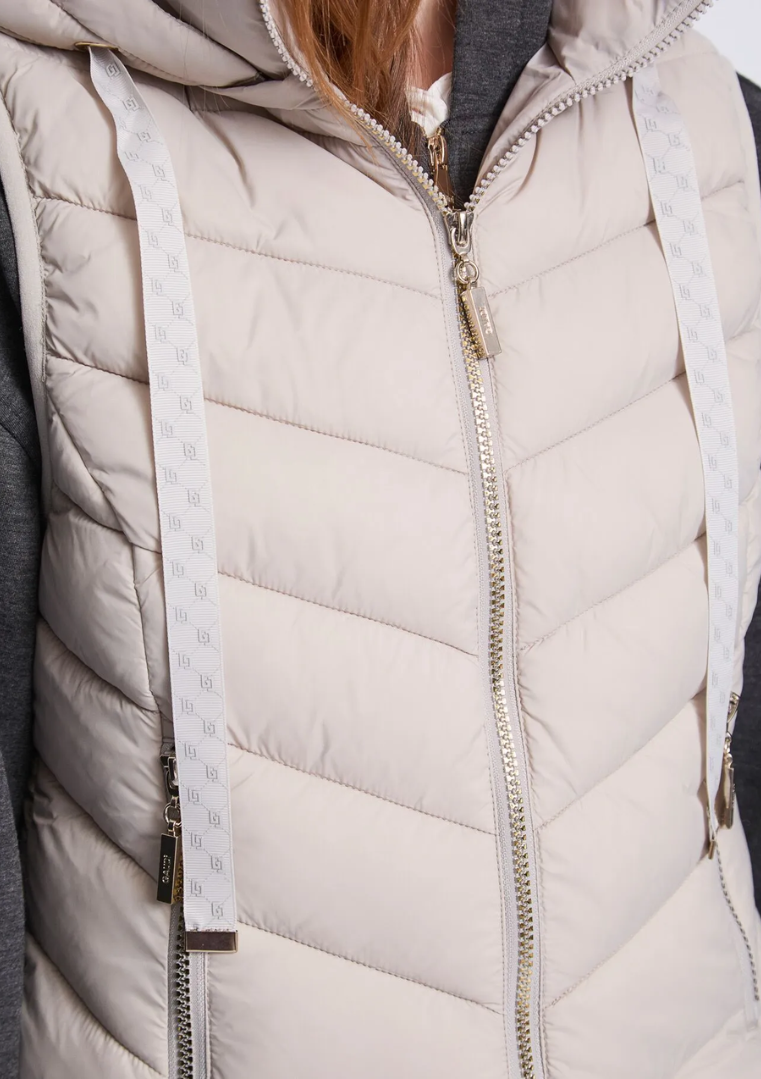 Gilet matelassé en nylon avec capuche pour femme