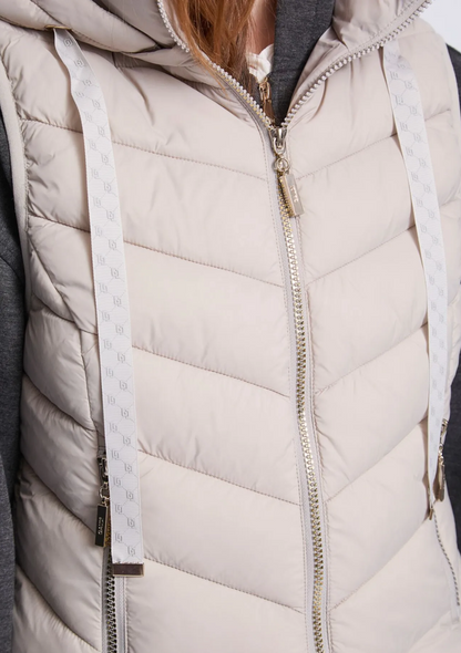 Gilet matelassé en nylon avec capuche pour femme